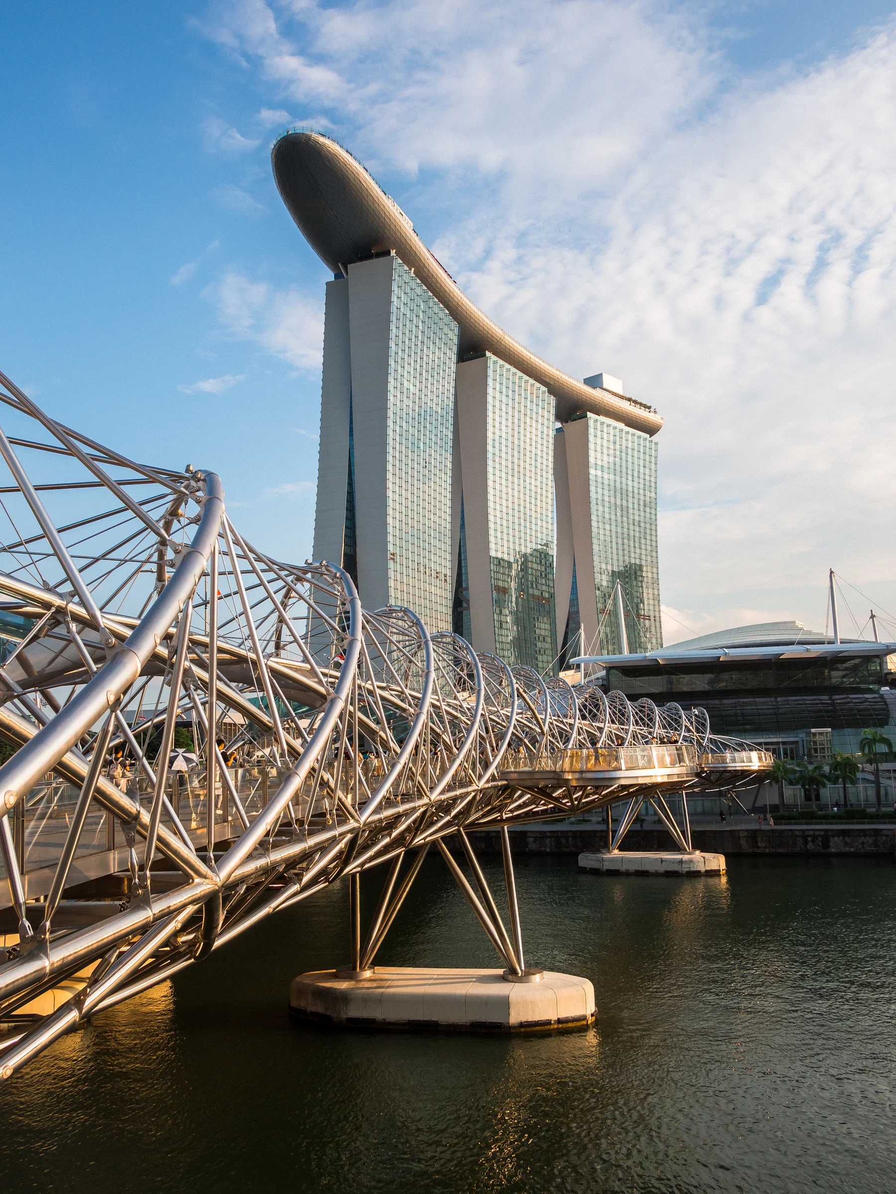 The Helix Bridge leading towards Marina Bay Sands at night